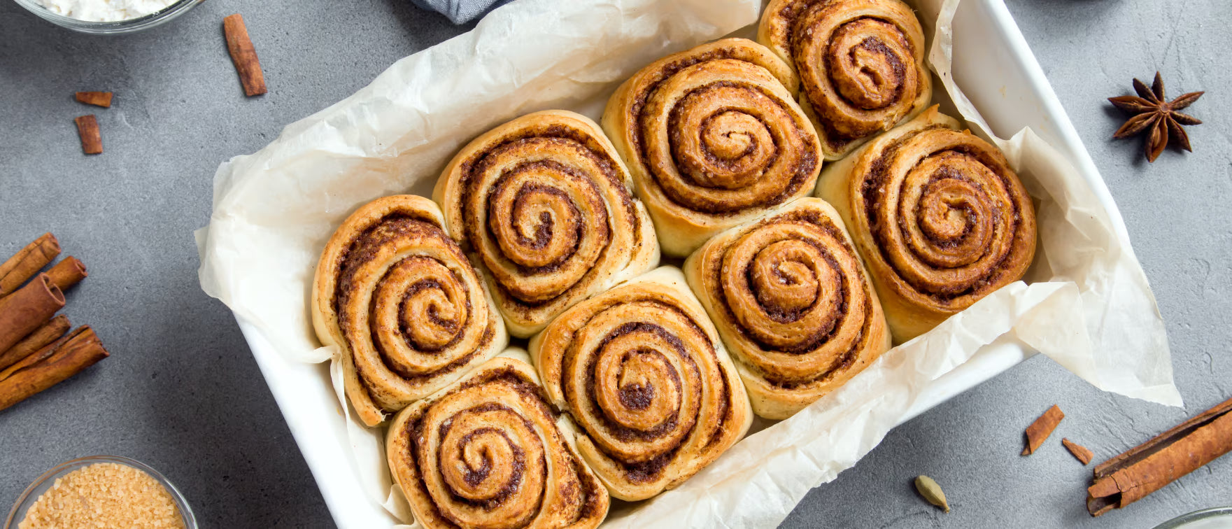 Freshly baked cinnamon rolls in a baking dish