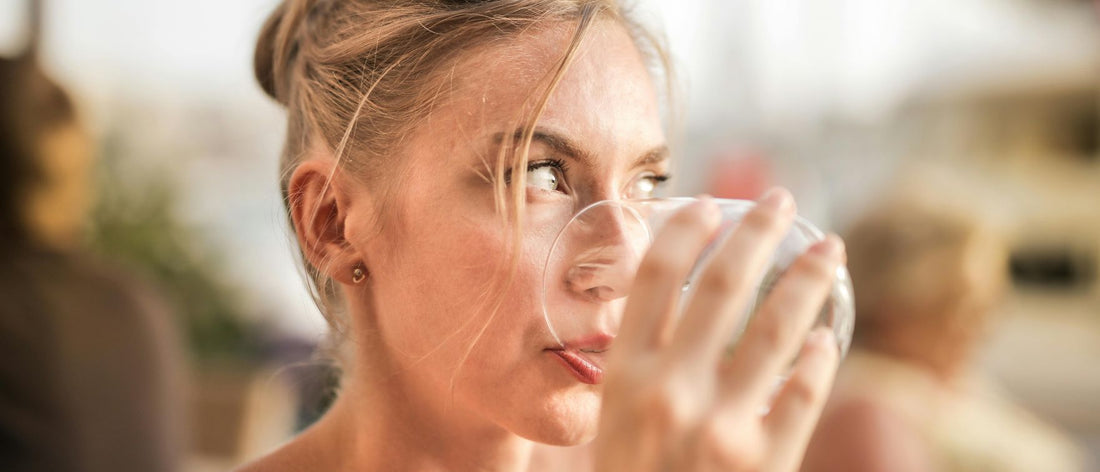 Blonde woman during supplementation of the best collagen for women, enjoying effects like thicker hair and smooth, wrinkle-free skin