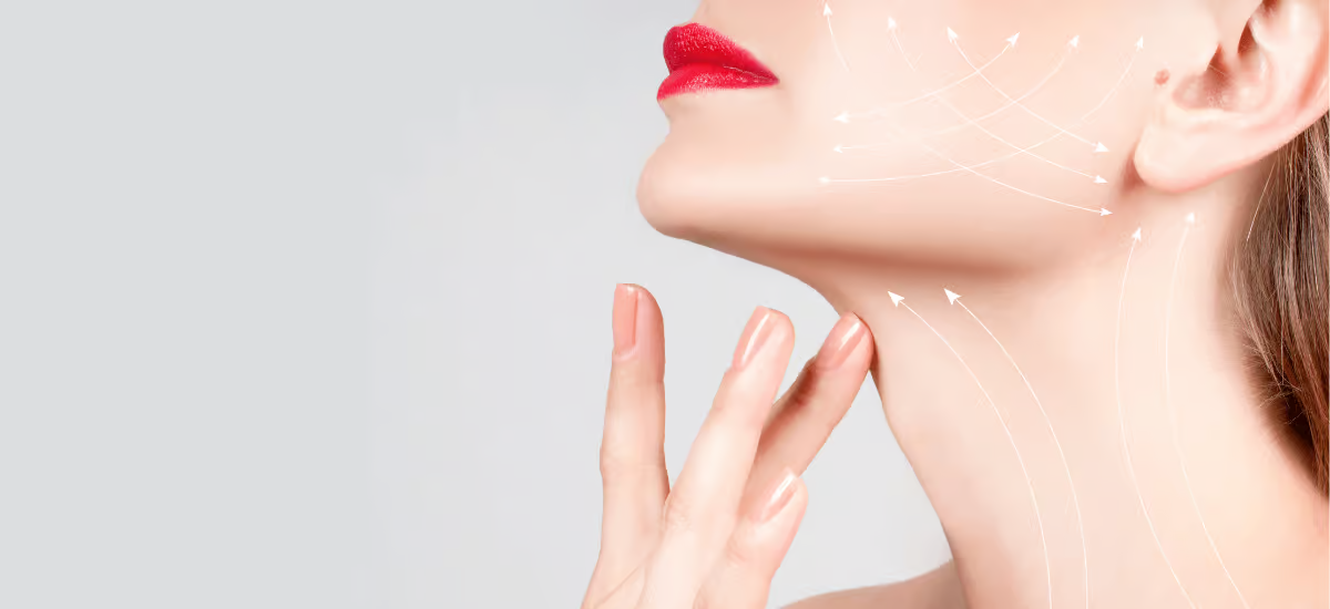 woman lies down and has a face mask applied|