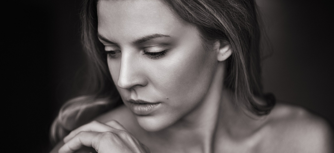 Close-up portrait of a woman with smooth skin and natural glow after using Primabiotic Collagen