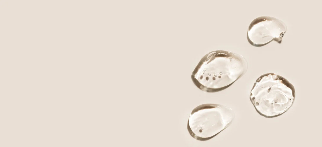 The photo shows hyaluronic acid on a beige background.