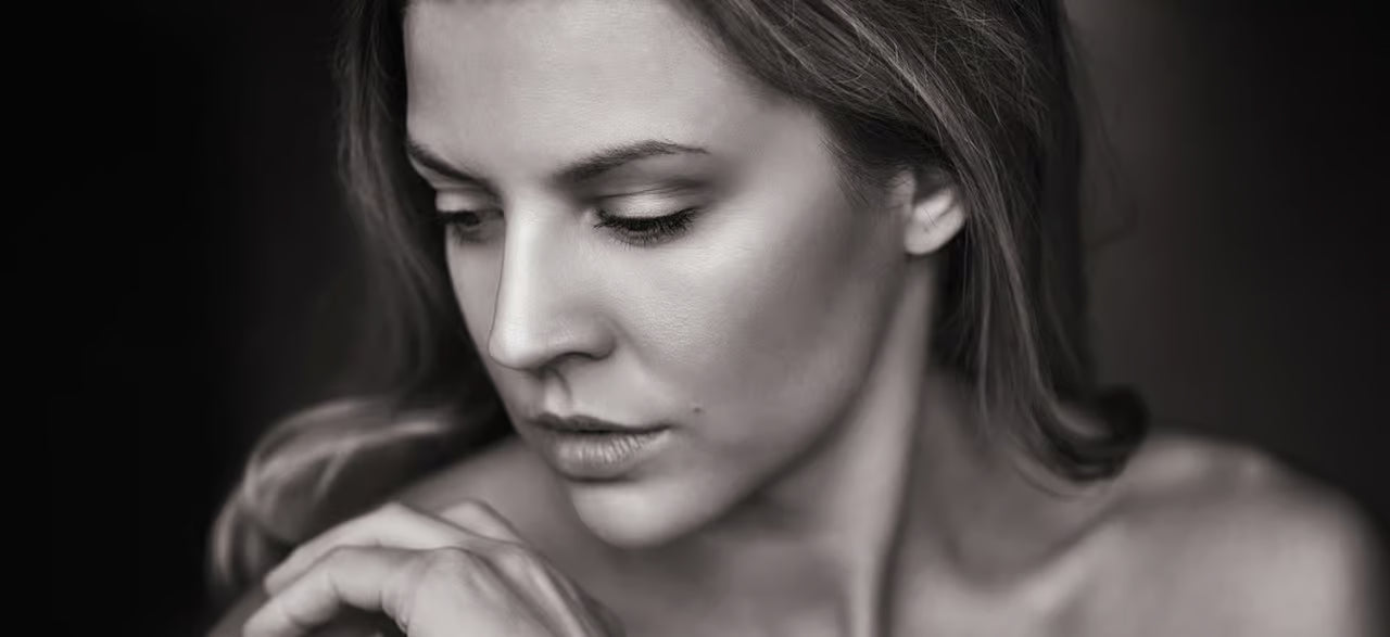 Close-up portrait of a woman with smooth, radiant skin after using Primabiotic Collagen