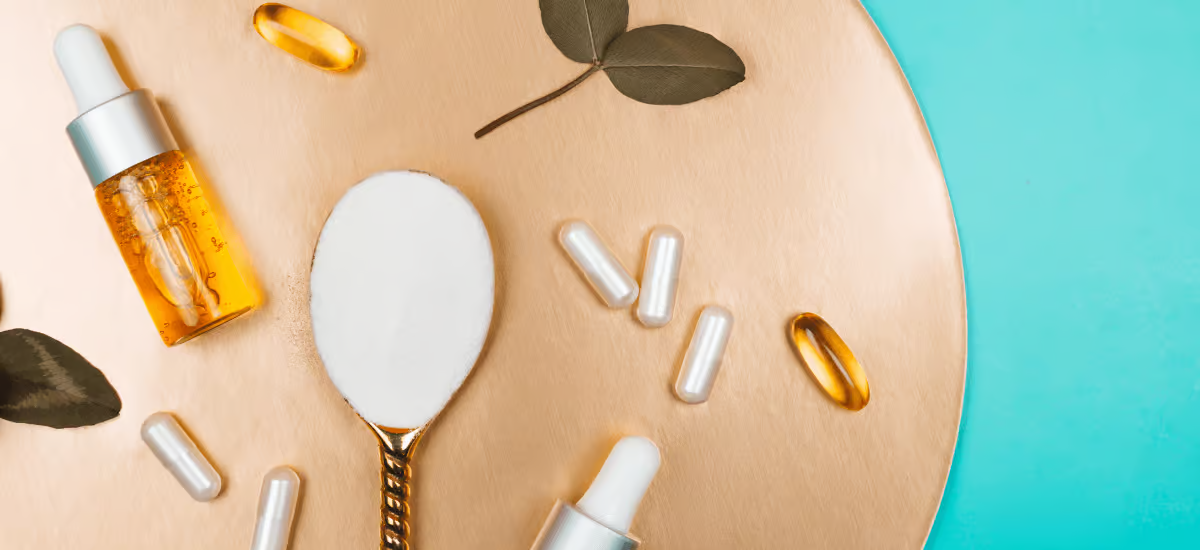 tablets and powder spread on a brown background